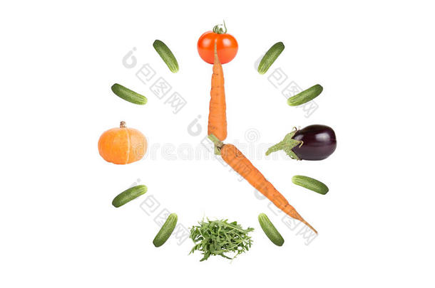 时钟的蔬菜与箭头的胡萝卜分离在白色