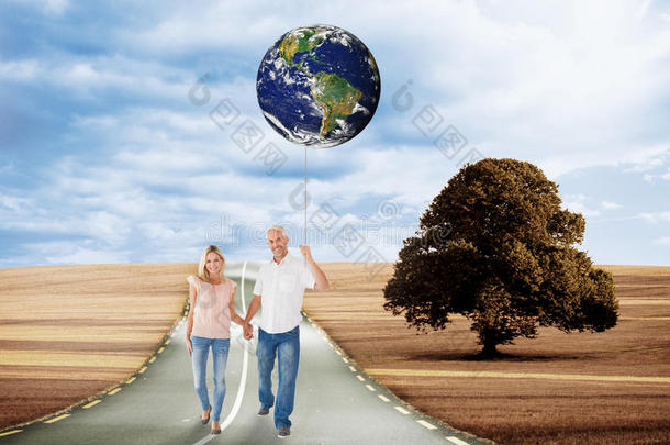幸福夫妇牵手散步的复合图像