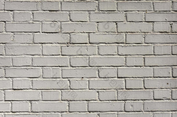 一个古老的<strong>凹凸</strong>不平砖墙的细节特写。