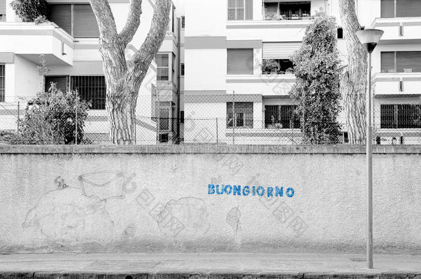 布尼奥诺！ 早上好，比萨，意大利，世界-<strong>一</strong>种充满乐观和善良的蓝色写在<strong>一座</strong>城市的墙上