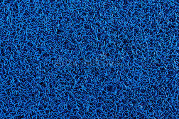 蓝色地毯背景，蓝色塑料门垫纹理和背景。