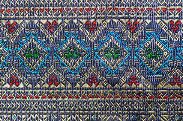 五颜六色的泰国丝绸手工艺品秘鲁风格的地毯表面关闭更多的这个主题和更多的纺织品秘鲁条纹美丽
