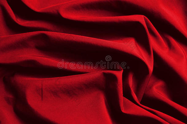 抽象背景豪华布或液体波或波浪褶皱的红色布质感