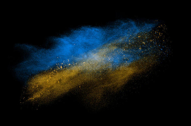 蓝色和黄色粉末爆炸隔离在黑色