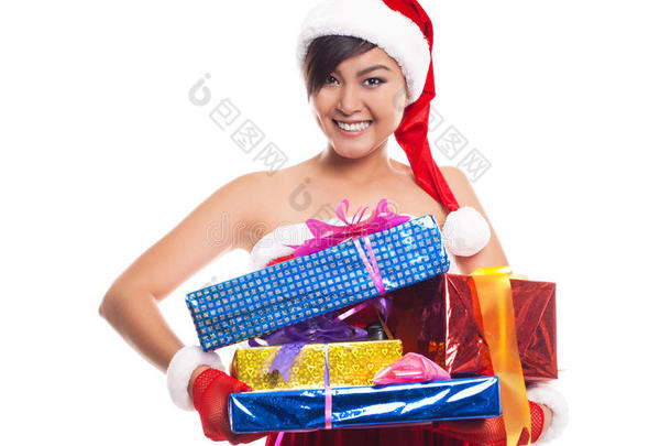 圣诞节女人拿着礼物戴着圣诞老人的帽子