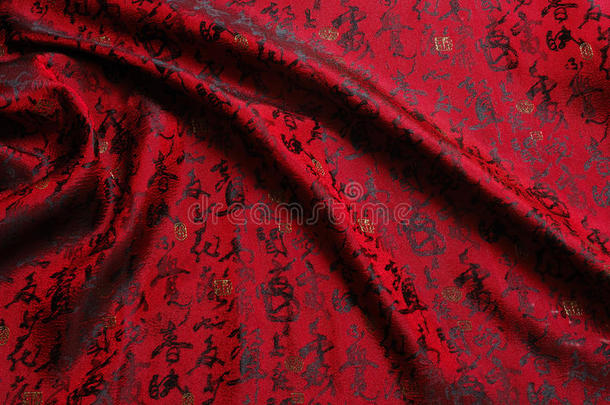 中国书法<strong>丝绸</strong>。中国风格。<strong>红色丝绸</strong>背景。