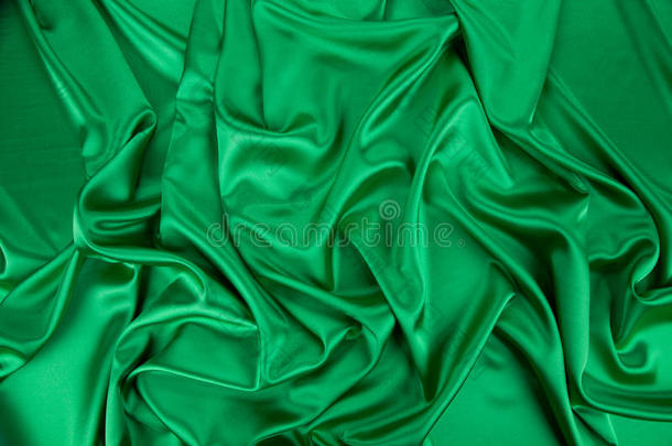 绿色丝绸布，有一些柔软的褶皱。