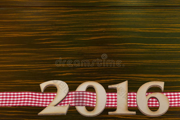 木制背景上的2016字幕