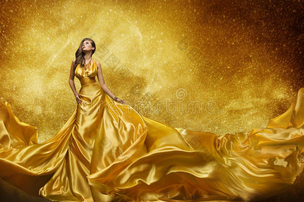 <strong>金色</strong>时尚模特连衣裙，女人<strong>金色丝绸</strong>长袍流动面料