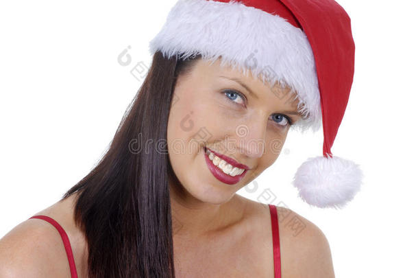 微笑的年轻成年女人的特写，红色的圣诞老人帽子隔离在白色上