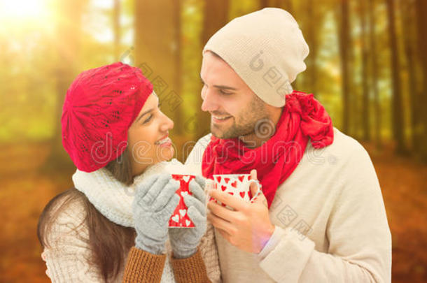 冬日情侣拿着杯子的合成图片