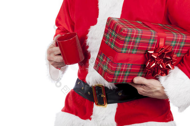 圣诞老人拿着一份红色的<strong>鞠躬</strong>礼物，喝了一杯茶