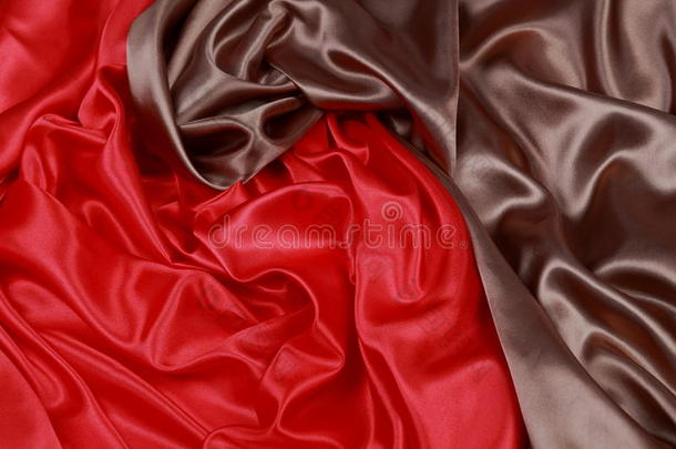 棕色和红色丝绸缎布波浪褶皱纹理背景