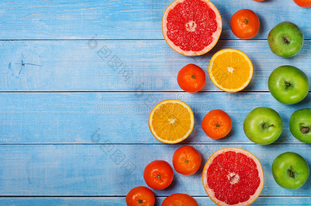 水果背景-葡萄柚，苹果，橘子和橘子