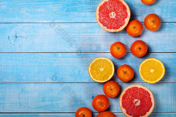 水果背景特写-葡萄柚，苹果，橘子和橘子