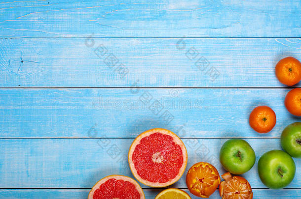 水果背景-葡萄柚，苹果，橘子和橘子