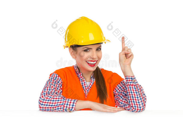 女建筑工人背后的标语<strong>牌指向</strong>上面