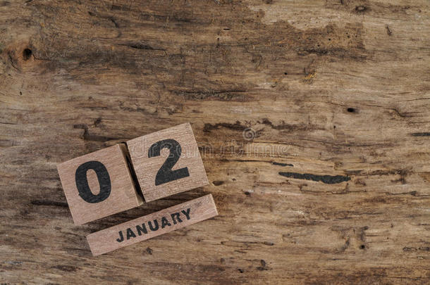 一月份木制背景的立方体日历