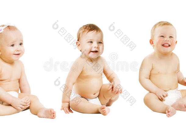 婴儿坐在白色的，蹒跚学步的孩子穿着尿布，男孩女孩