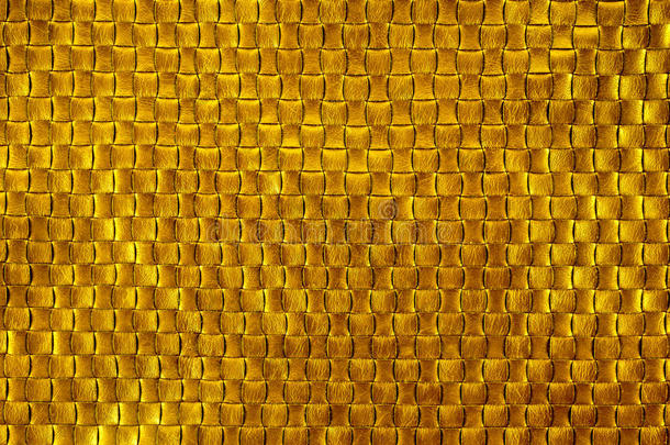 皮革编织的金色纹理。 金色的背景。