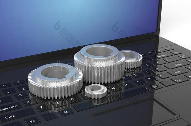 笔记本电脑键盘上的3D银色齿轮