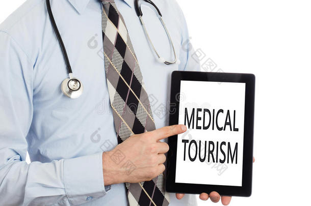 医生持有平板电脑-医疗旅游