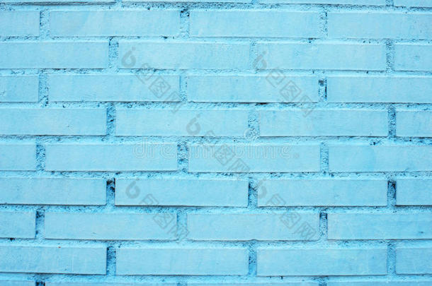 砖墙。 砖墙涂成蓝色。 纹理背景