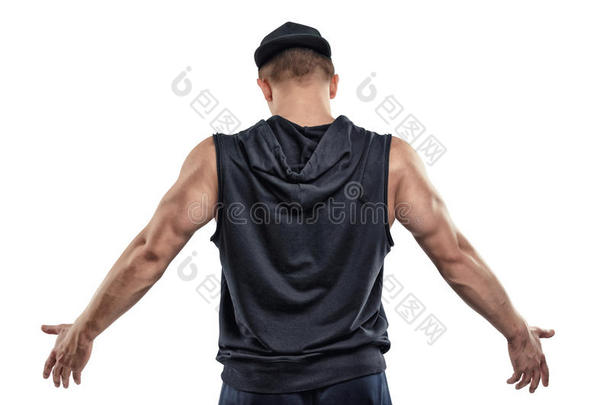孤立的健身者的后视图，姿势和显示手臂肌肉