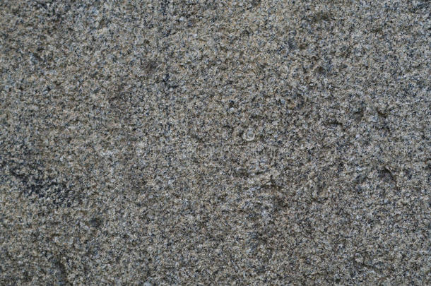灰色粗糙的花岗岩。