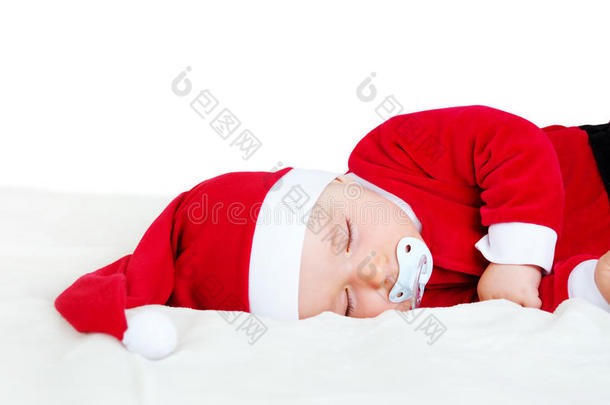宝贝穿着圣诞老人的衣服睡觉