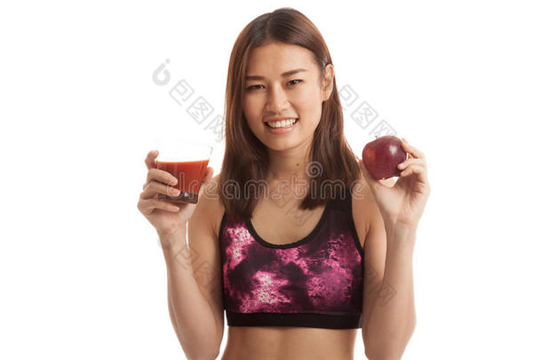 美丽健康的亚洲女孩，西红柿汁和苹果。