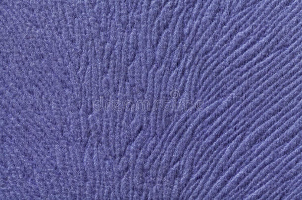 蓝色背景来自柔软的纺织材料。 具有天然纹理的织物。