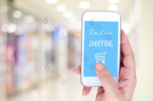 手持智能手机与网上购物设备在屏幕上o