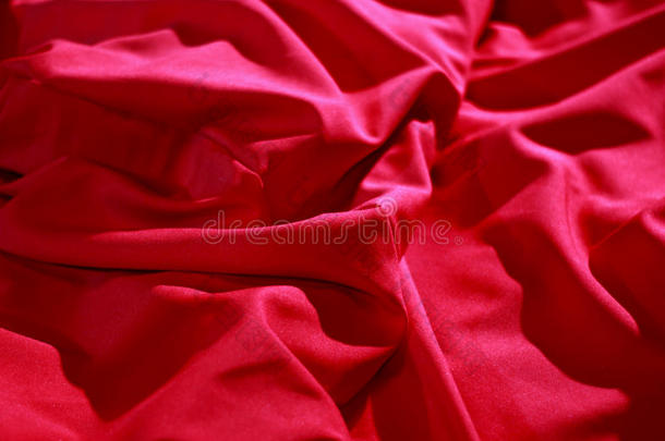 床单店。 红色丝绸上的皱纹详细的股票形象