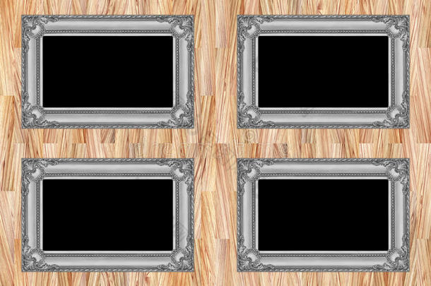 现代木墙上的四个灰色木框