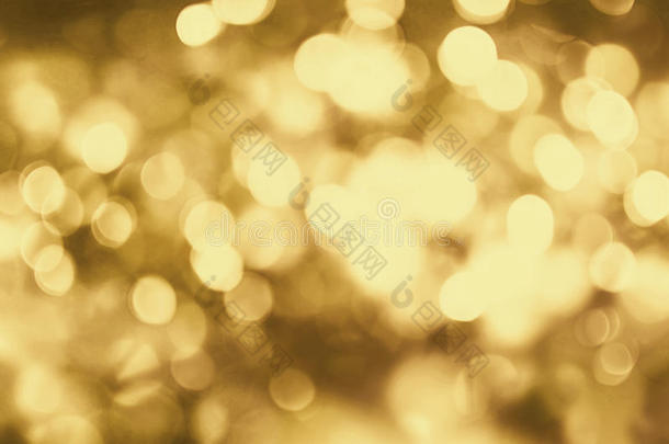 圣诞背景。 黄金假期抽象闪光散焦