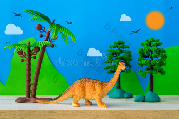 腕龙恐龙玩具模型在野生模型背景下
