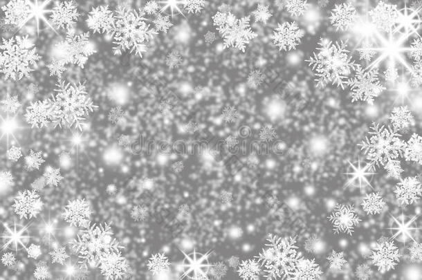 圣诞背景与雪花，星星和文字的地方。 明亮的假日背景与复制空间。 灰色和银色