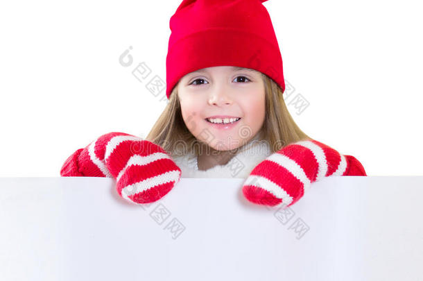 孩子穿着圣诞老人的衣服微笑，白色的<strong>床单</strong>被隔离。