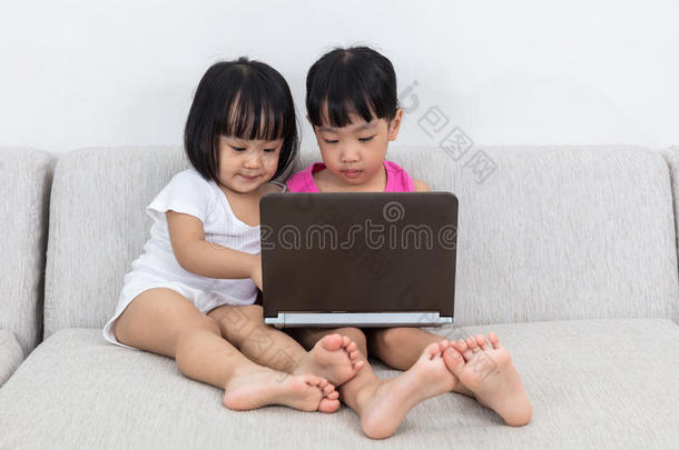 亚洲中国小姐妹玩电脑
