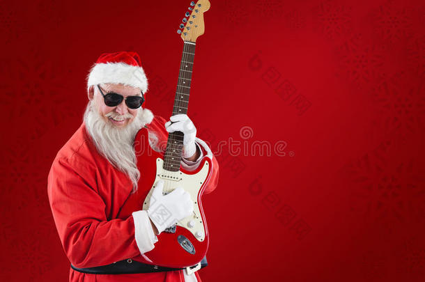 快乐的圣诞老人弹吉他的复合形象
