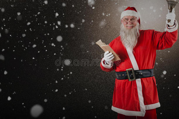 圣诞老人持有圣经和铃铛的复合图像