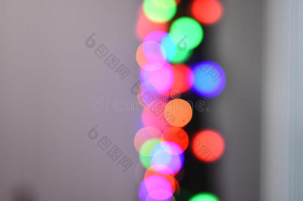 五颜六色的明星波克模糊的抽象背景。 圣诞节和新年派对的概念
