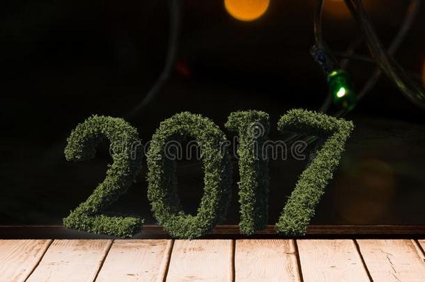 2017年，在木板上的草地上贴着一个复合图像3D的圣诞灯