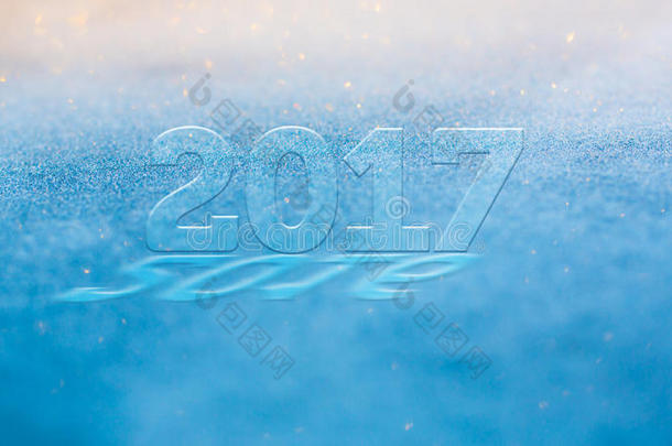霜光闪闪发光模糊的新年2017通过2016年的问候