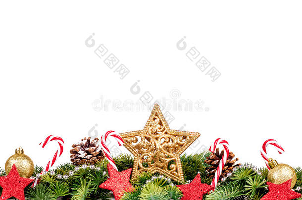 圣诞边缘-树枝与金球，糖果和<strong>大明星</strong>隔离在白色