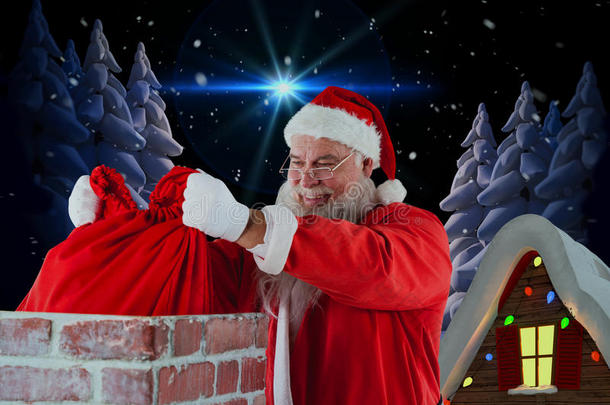 圣诞老人将圣诞袋放入烟囱的复合图像