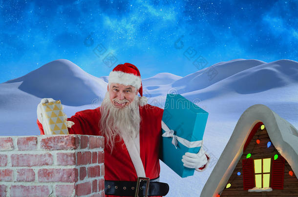 圣诞老人将礼品盒放入烟囱的肖像的复合图像