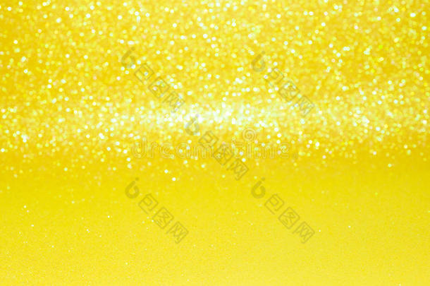 散焦的抽象黄色闪光与Bokeh背景