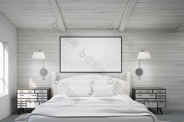木制房间里的双人床上有海报